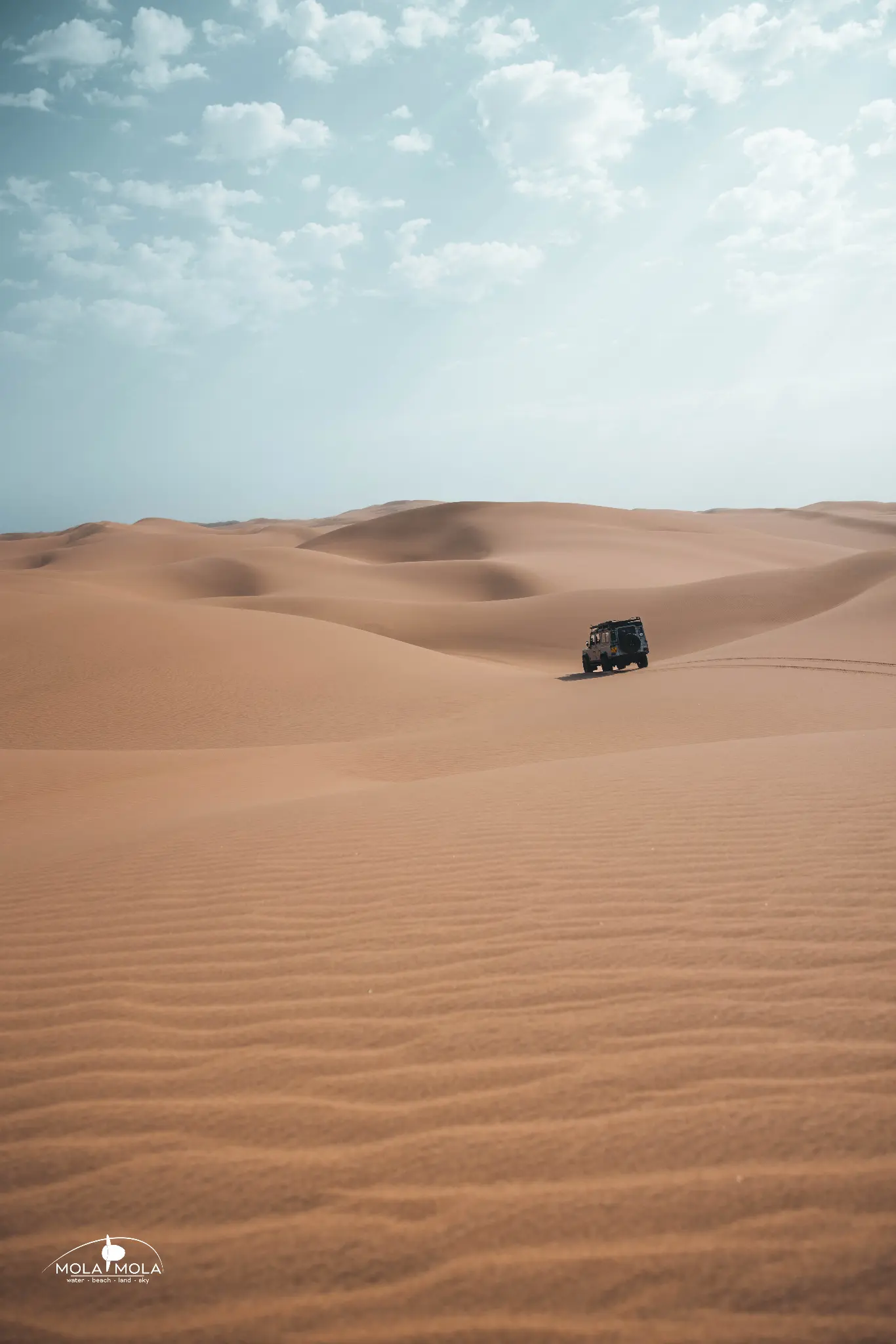 Endless dunes under blue sky