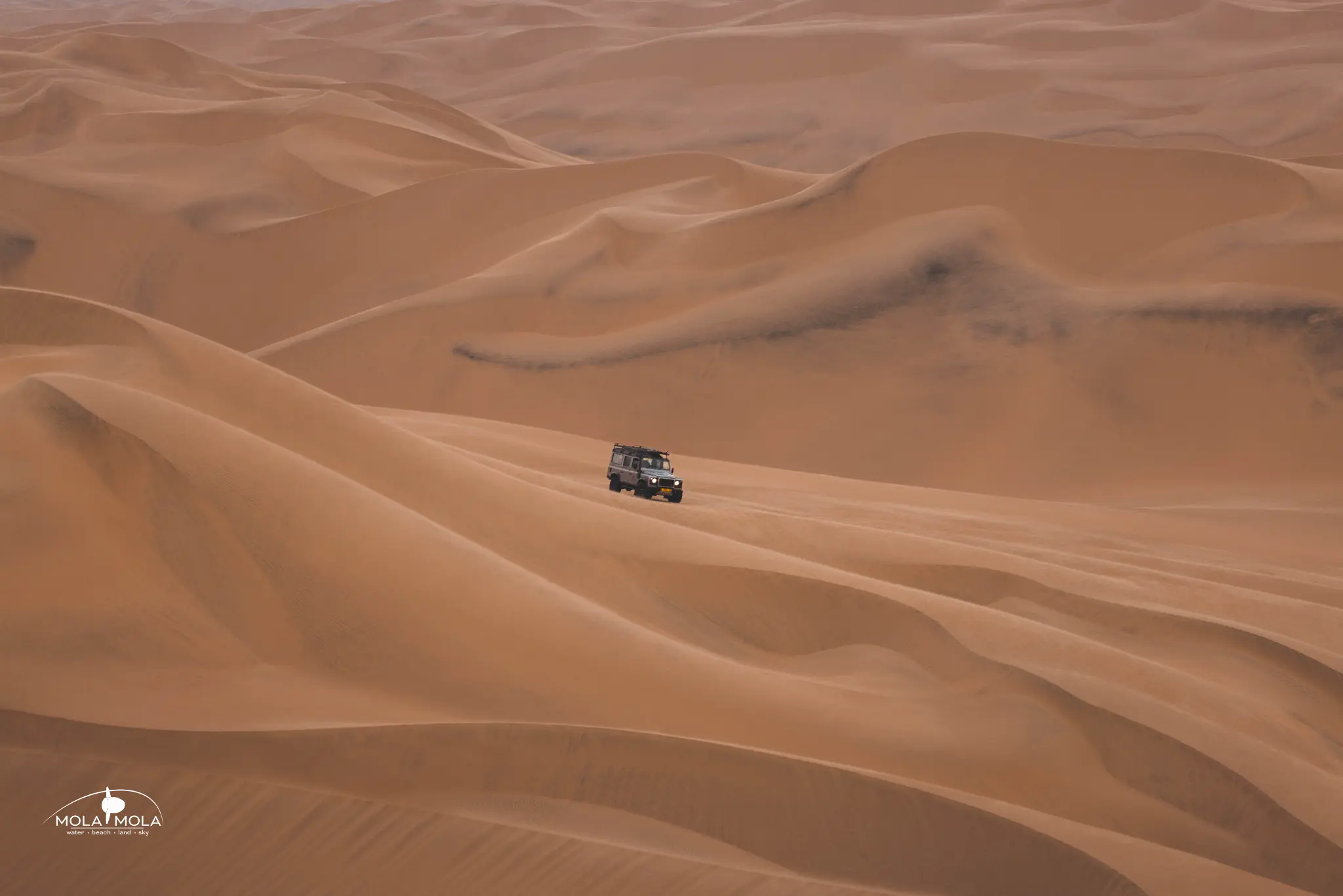 4x4 traversing massive dune field