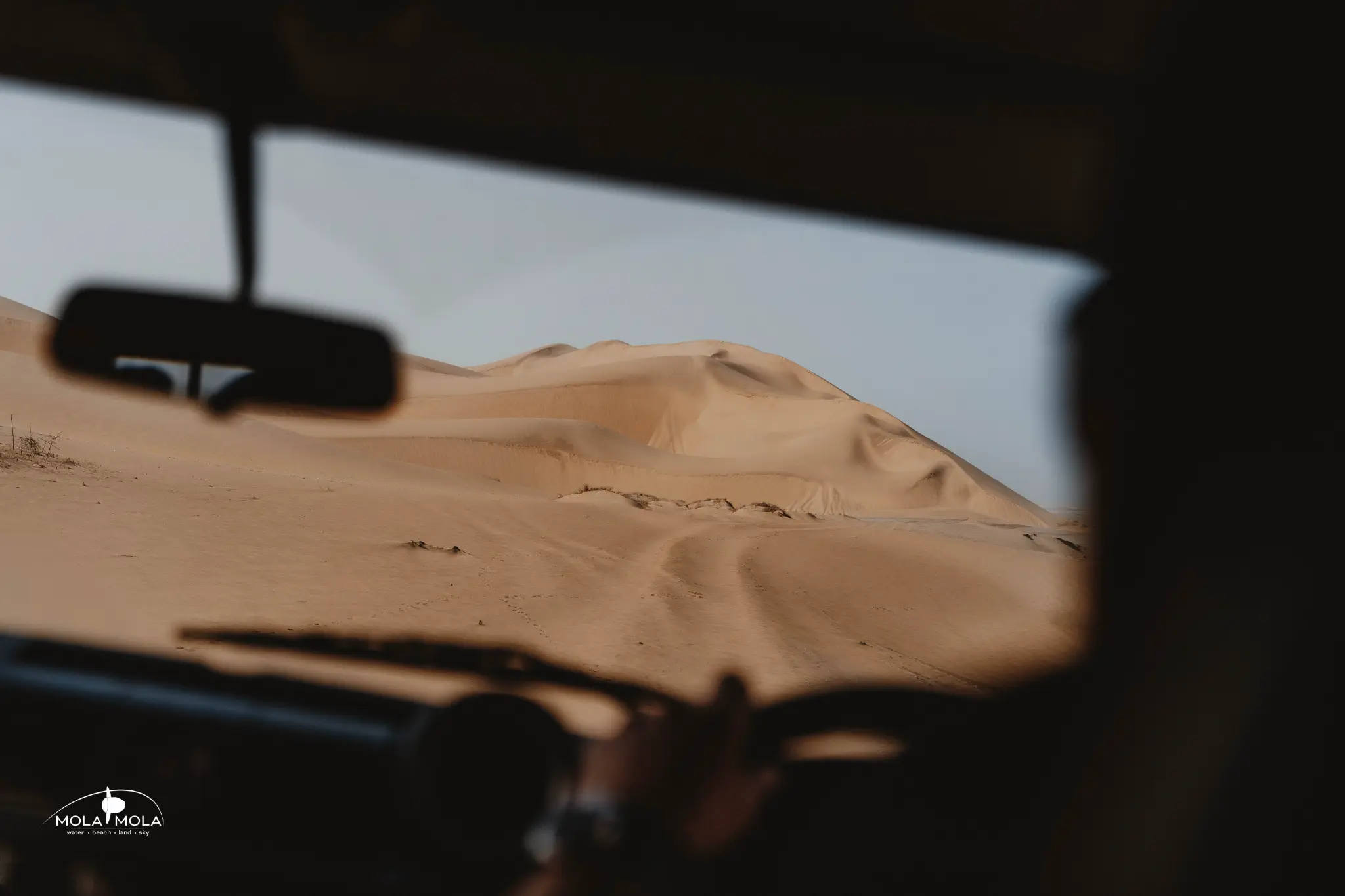 Dunes through the windscreen